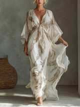 WOMEN'S IVORY AND TAUPE CHIFFON FABRIC DOLMAN SLEEVE MAXI DRESS WITH TWIST FRONT & PALM LEAF PRINT MDZ0332B6T