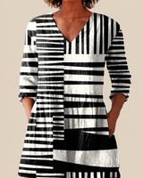 NAOMI | LONG BLOUSE WITH A STRIKING PRINT